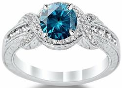 Twisting Channel Set Knot Diamond Engagement Ring with a 1 Carat Blue Diamond Heirloom