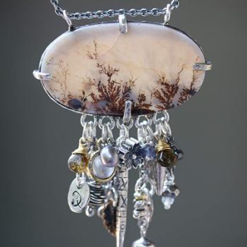 Beautiful tree in dendritic quartz in sterling silver prongs setting with aquamarine gemstone on the side with silver chain necklace