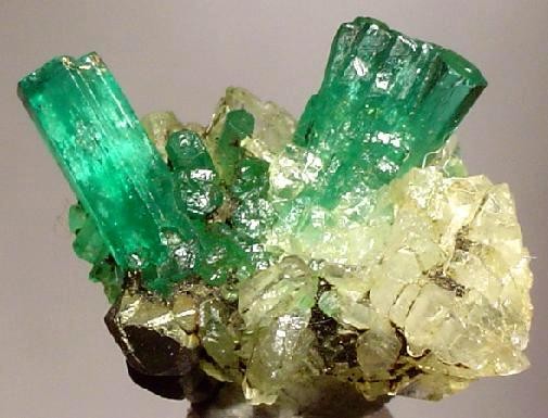 emerald crystals set on calcite matrix