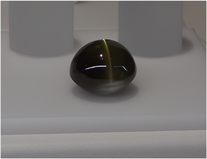 Cat's-eye chrysoberyl displaying a bright band of chatoyancy