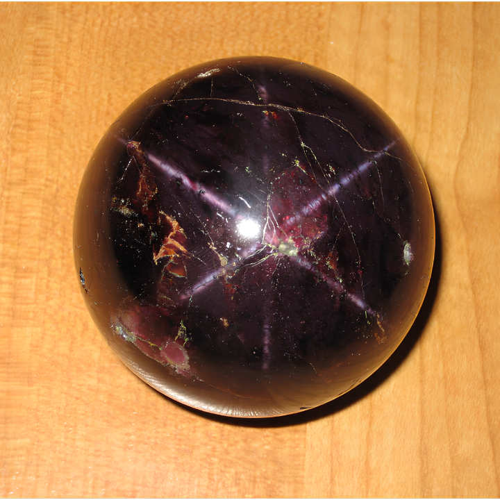 Six-ray Star of Idaho garnet displaying asterism