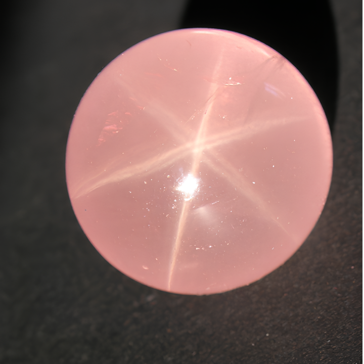Star rose quartz sphere from Madagascar displaying asterism